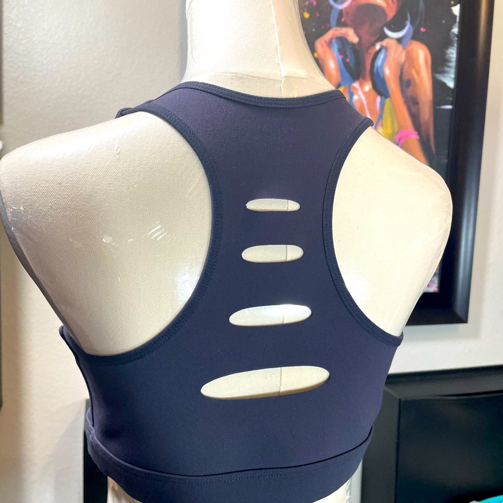 Peloton sports bra size medium racer back with cut outs, gently preowned grey